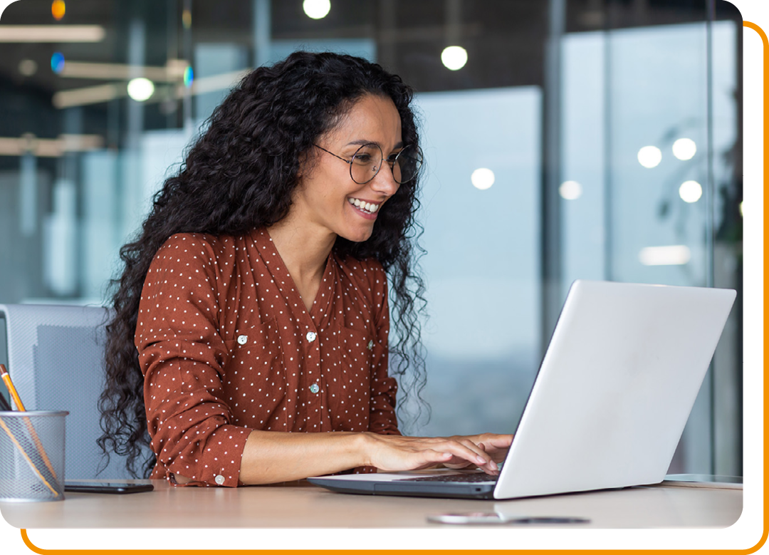 Image of a business professional working on a laptop