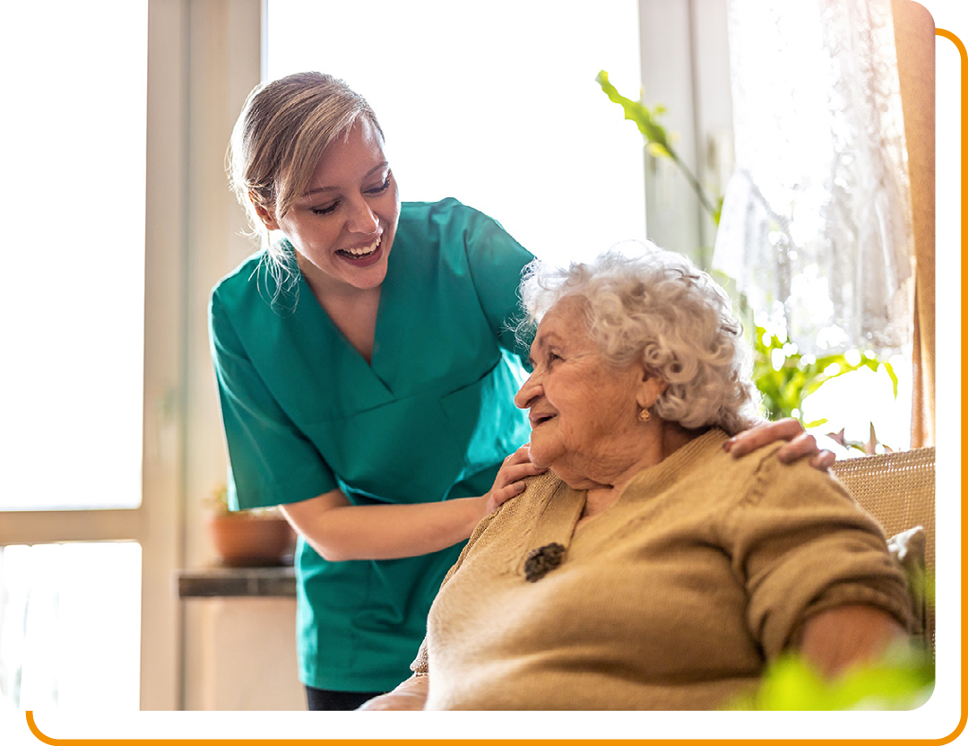 Image of a carer with an elderly patient
