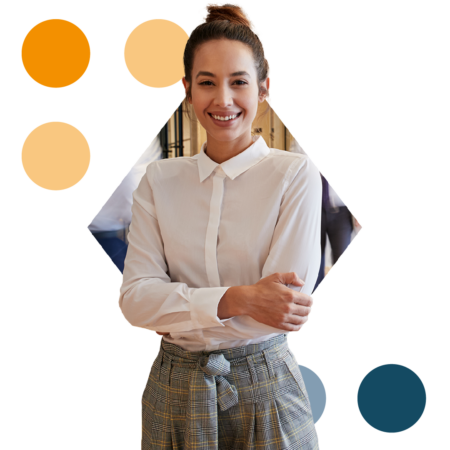 Image of a smiling business person stood with their arms crossed