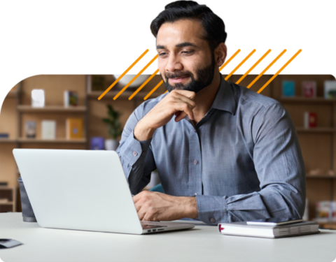 Image of a business professional working on a laptop