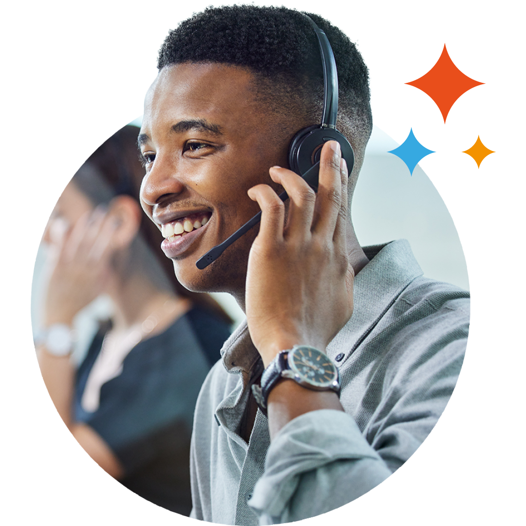 Image of a smiling IT support professional talking on a headset
