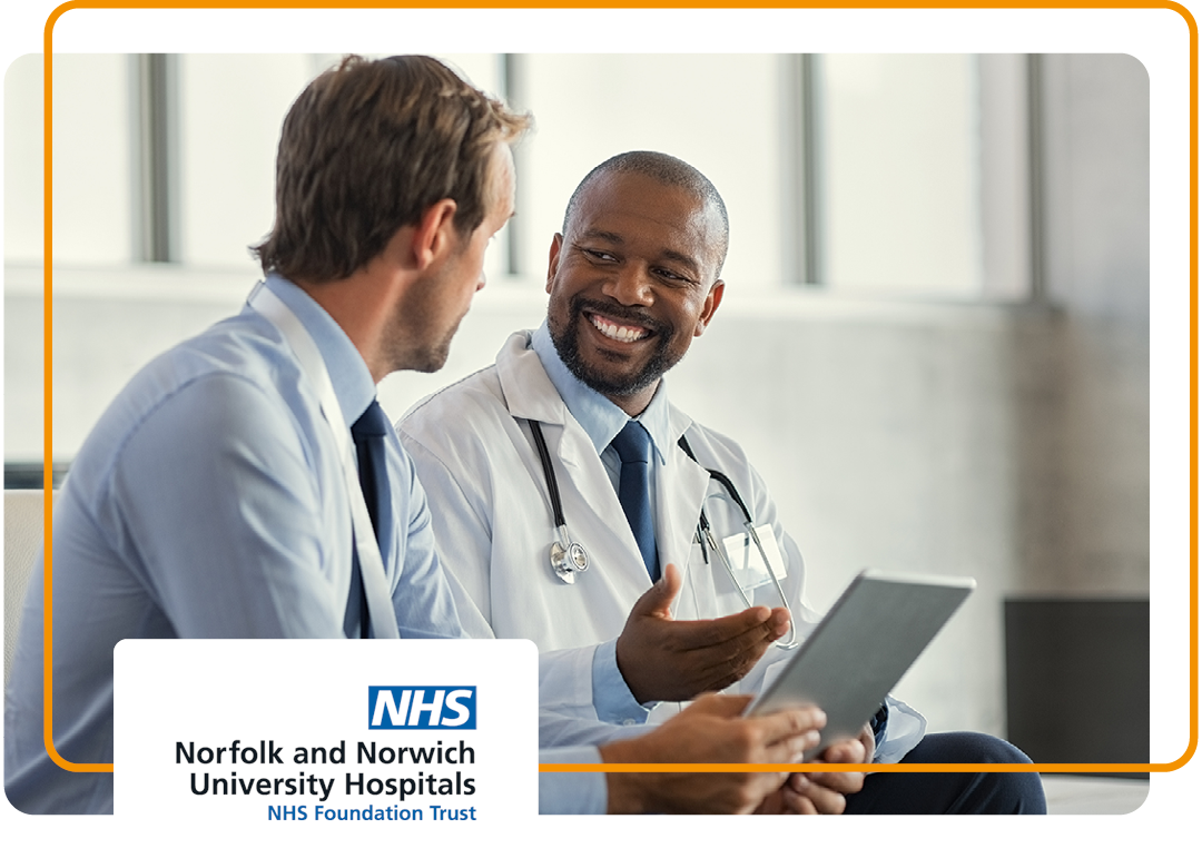 Image of two smiling doctors conversing with the Norfolk and Norwich University Hospitals logo