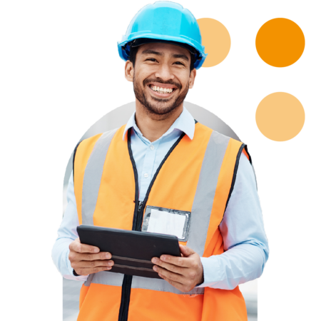 Image of a smiling construction manager holding a tablet