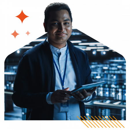 Person with a tablet device on a server room