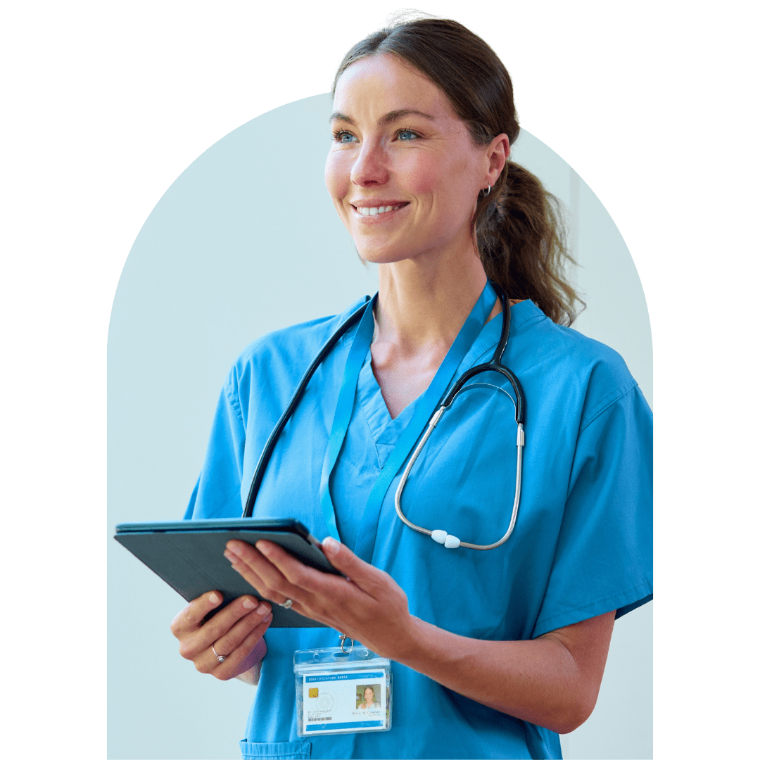 woman smiling in healthcare uniform