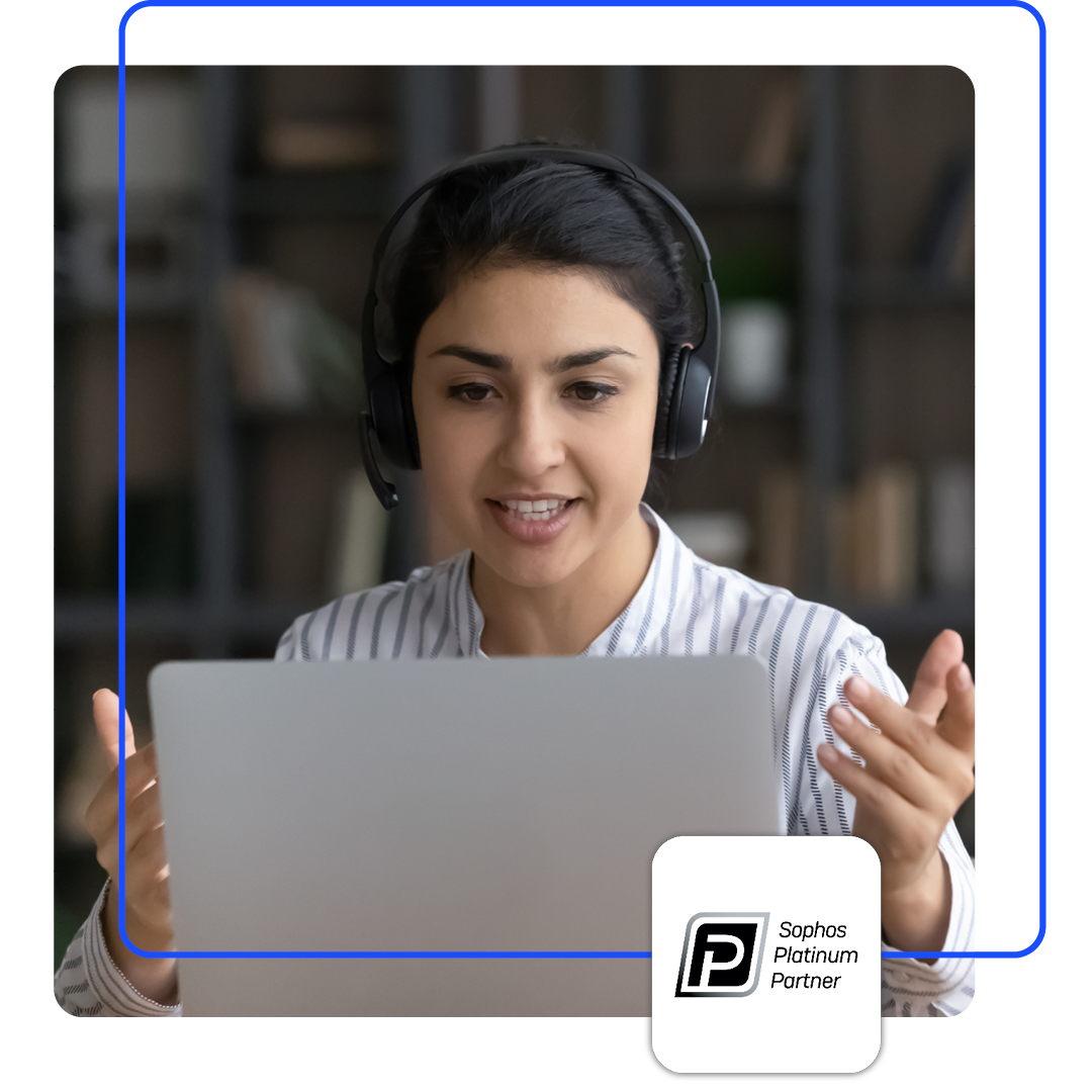 Image of a business professional talking on a virtual call with our Sophos Platinum Partner logo