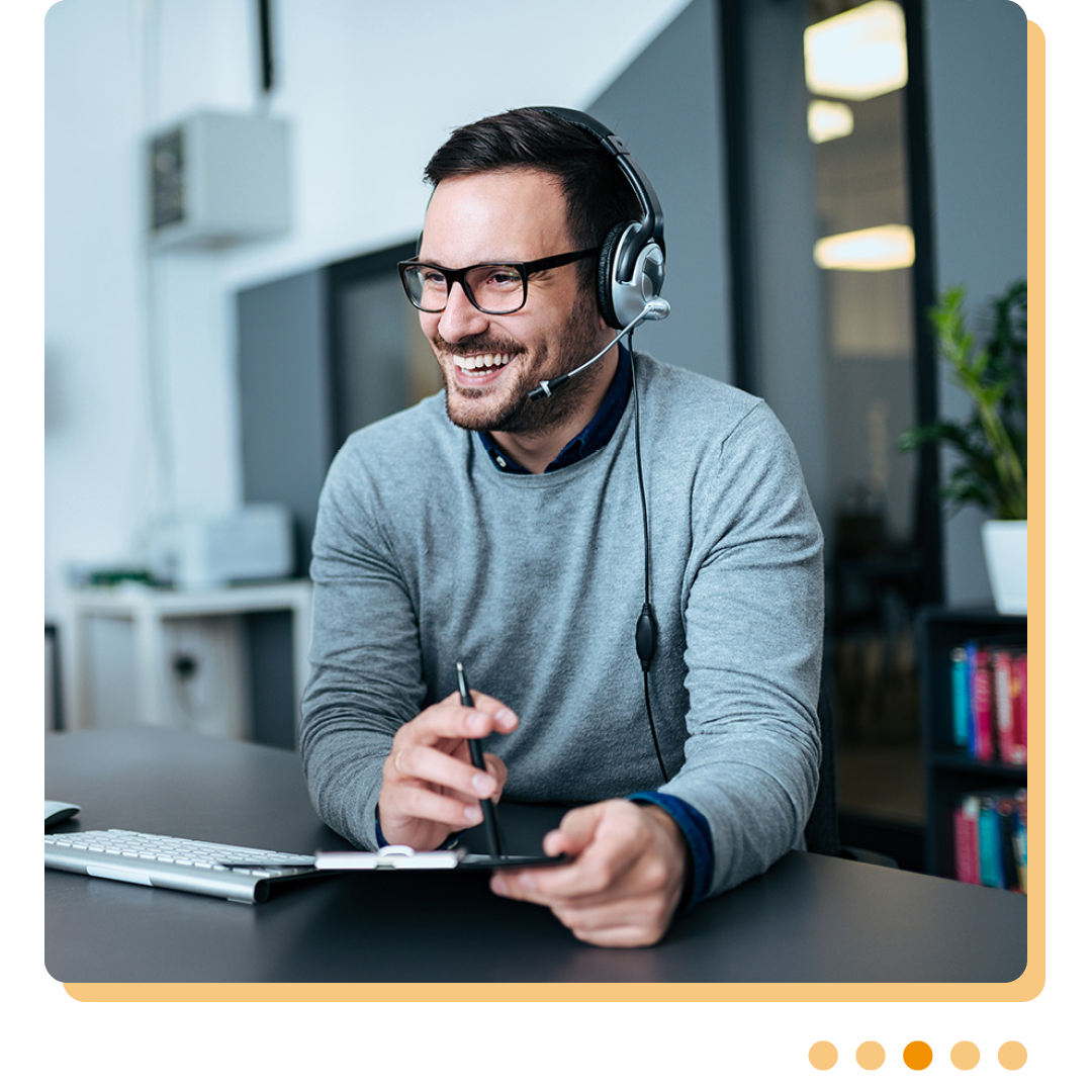 Image of an IT support professional talking on a headset