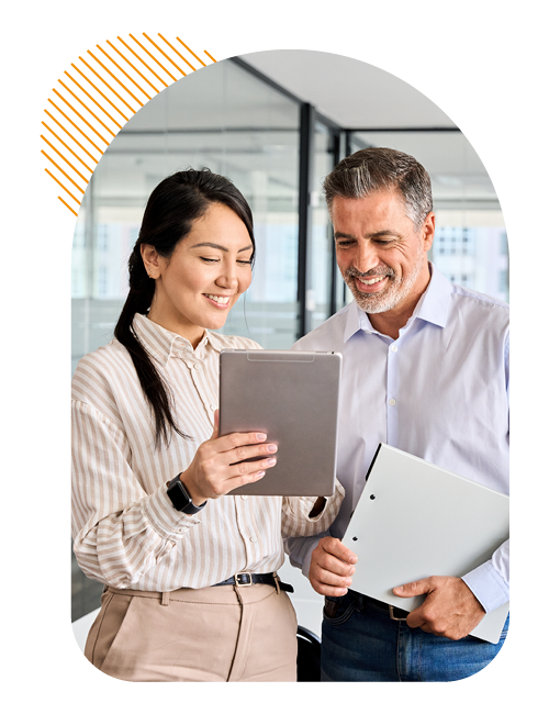 Image of two professional colleagues looking at a tablet