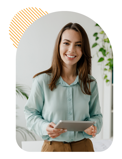 Image of a business professional stood holding a tablet