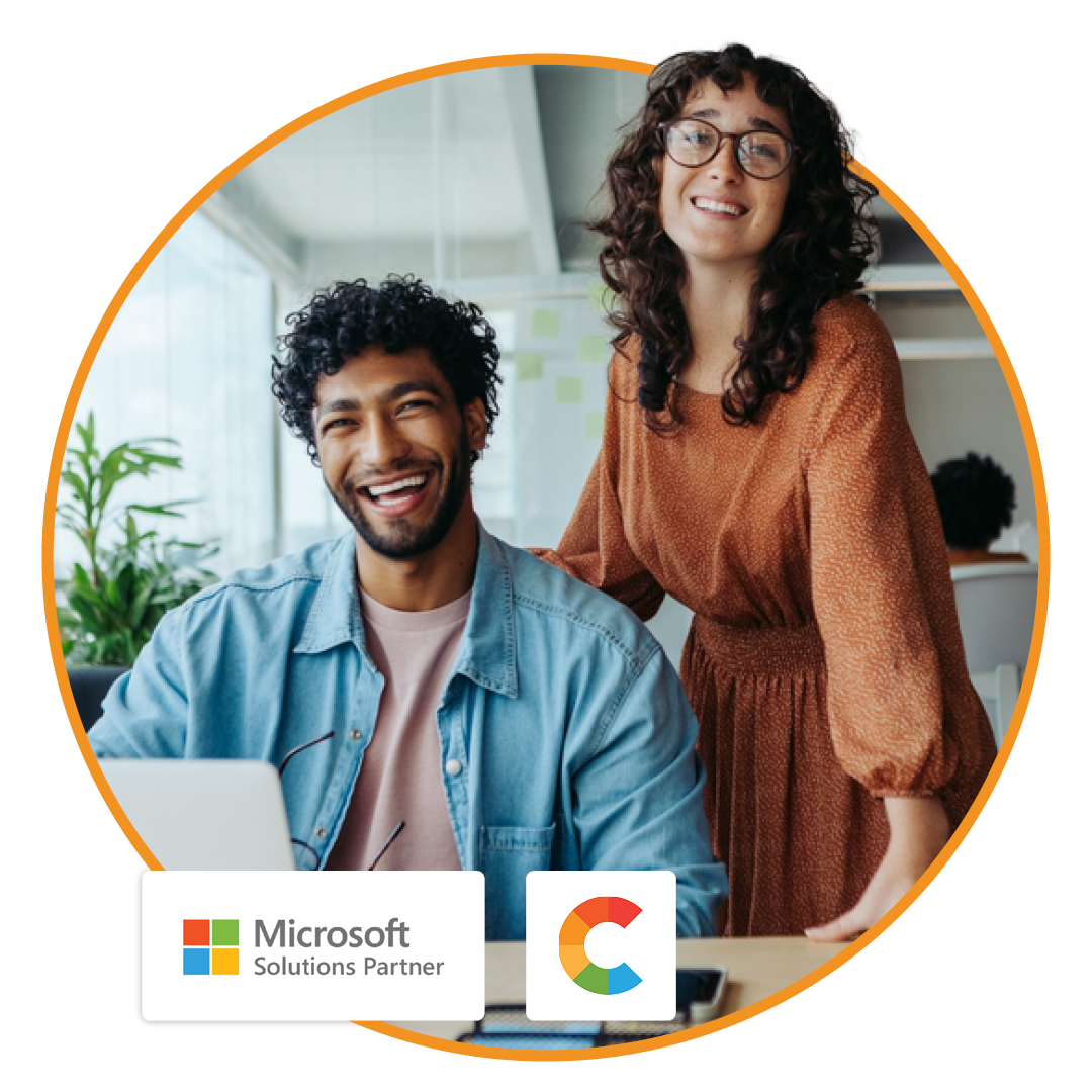 Two professionals, a man and a woman, collaborating in a modern office.