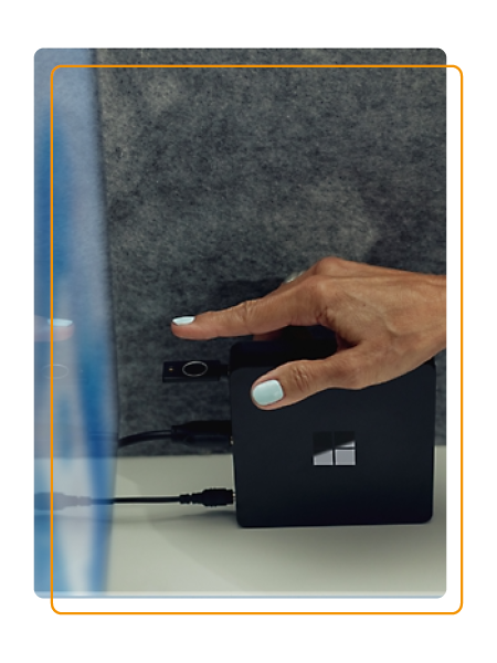 Person accessing a W365 Link device using biometric fingerprint scanner
