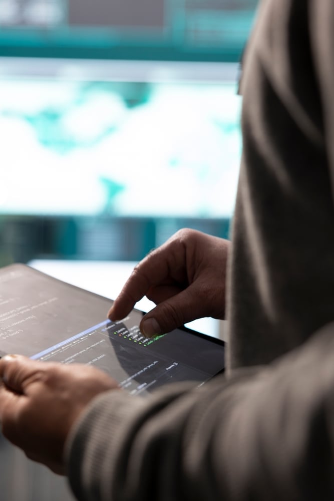 cyber security expert working on device