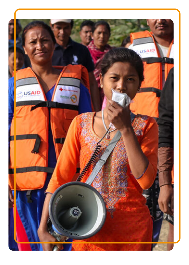 Aid worker holding a megaphone