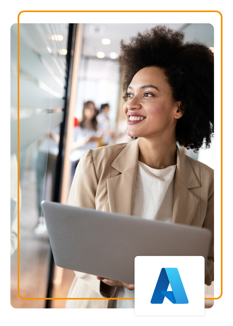 smiling women holding a laptop