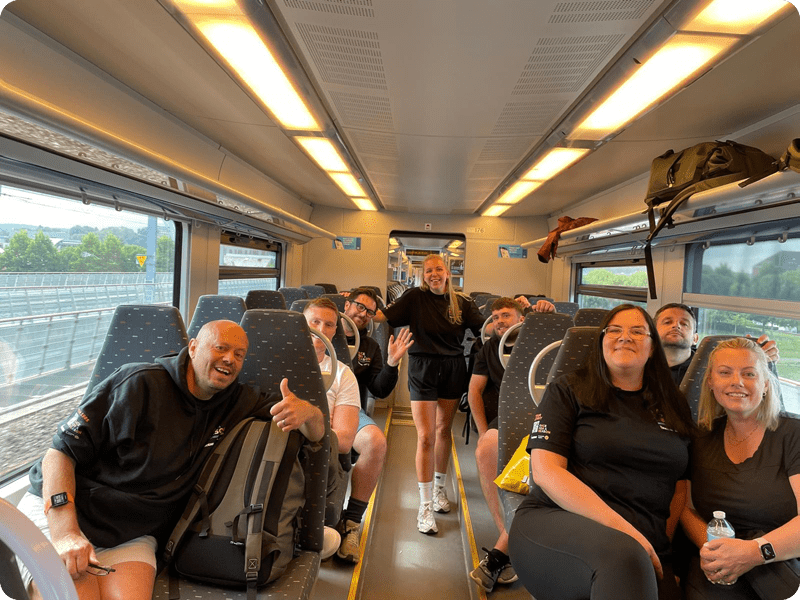 Image of our Race for a Reason racers travelling on a train