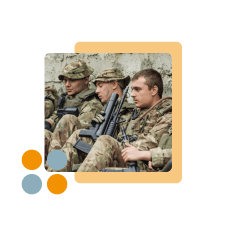 British soldiers in uniform sat down