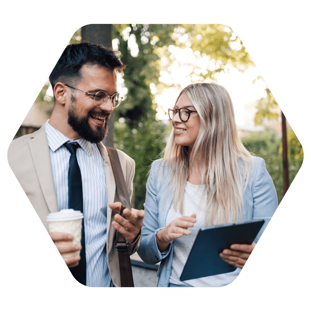 two people talking over coffee