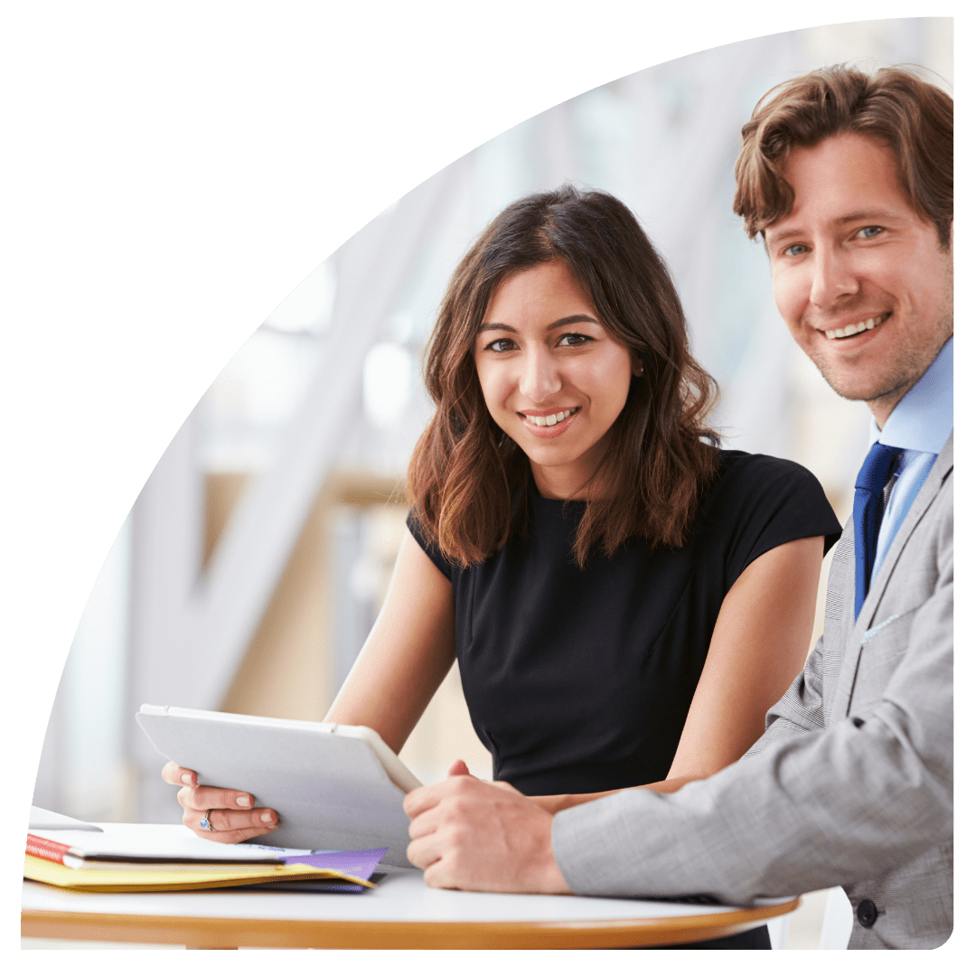 two colleagues smiling