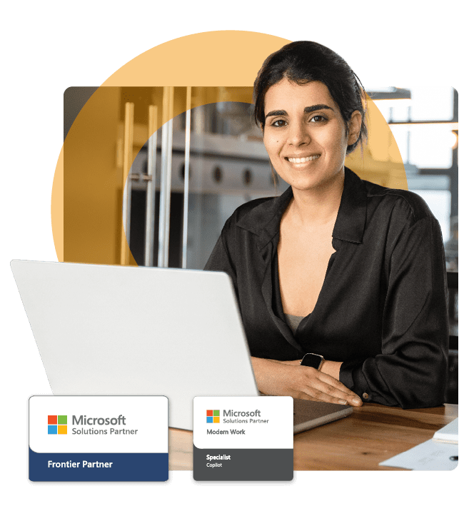 Person smiling using a laptop