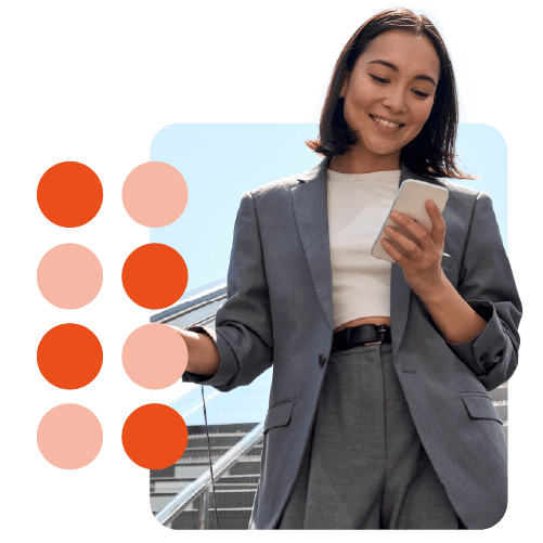person smiling holding a mobile phone