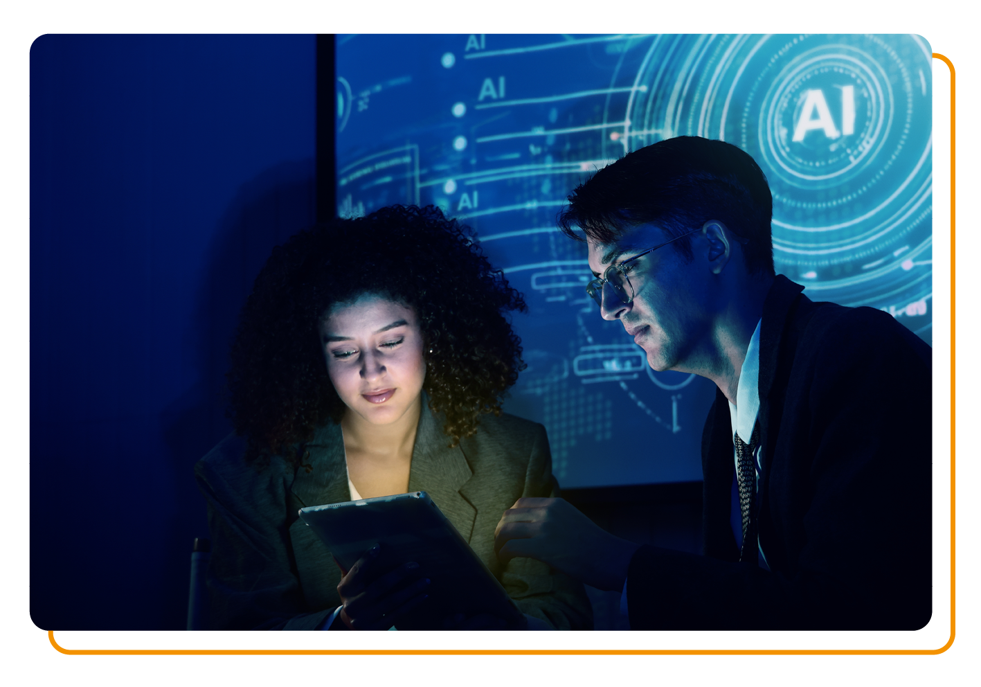 Man and woman working with AI technology