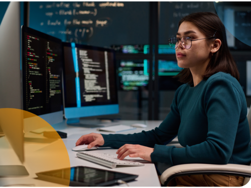 Image of a cyber security professional working on a computer