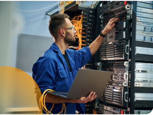 Image of an IT professional working on a data centre