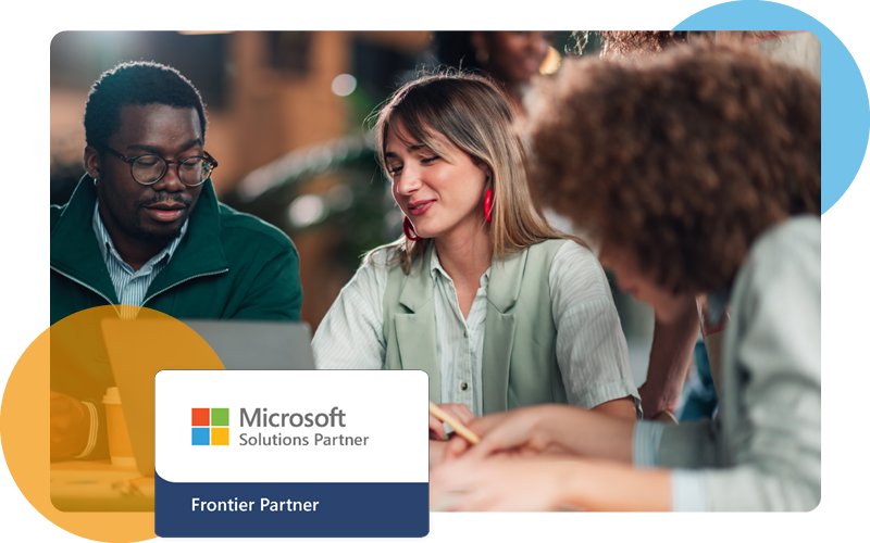 Image of a group of business professionals talking around a table with the Microsoft Frontier Partner logo overlayed