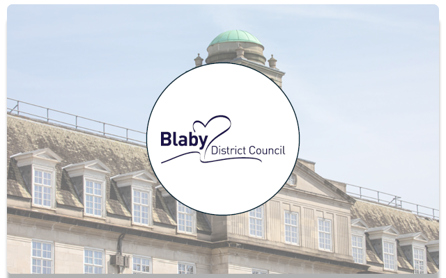 Image of a UK council building with Blaby Council Logo over the top