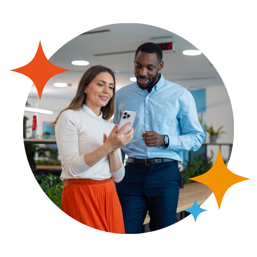 Two colleagues looking at phone