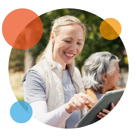 Charity volunteer holding tablet device